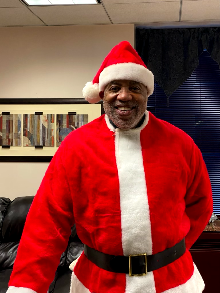 Dewey McClain dressed as Santa